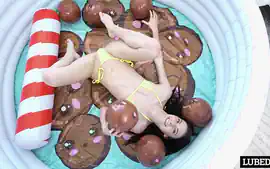 Bella Nova Soaks Her Bald Cunt In Oil