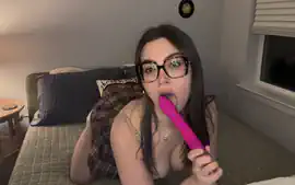 Giving My Large Pink Dildo A Blowjob In A Mini Skirt