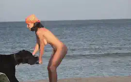 Perfect slim girl playing on the beach