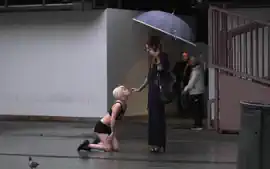 Petite blonde disgraced on the rain
